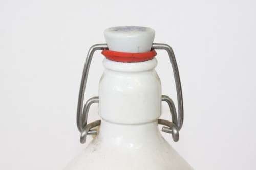 An awesome vintage German "Rauchenfelser Steinbier" porcelain Xmas commemorative flip-top decanter