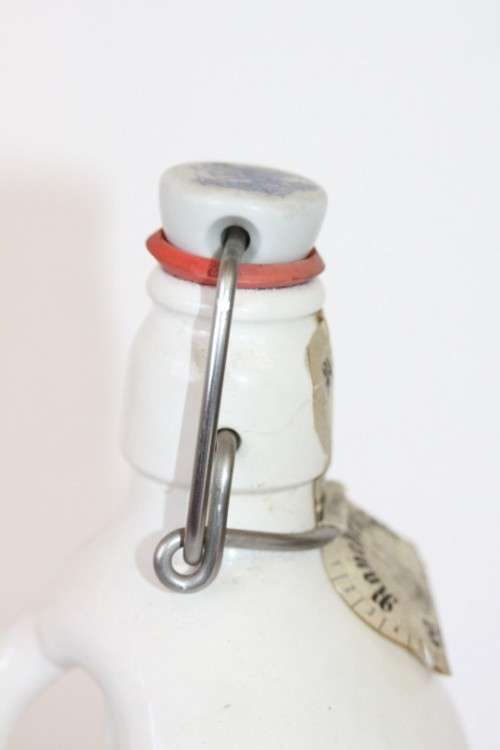 An awesome vintage German "Rauchenfelser Steinbier" porcelain Xmas commemorative flip-top decanter