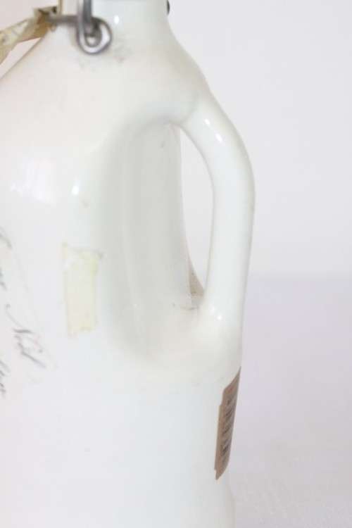 An awesome vintage German "Rauchenfelser Steinbier" porcelain Xmas commemorative flip-top decanter
