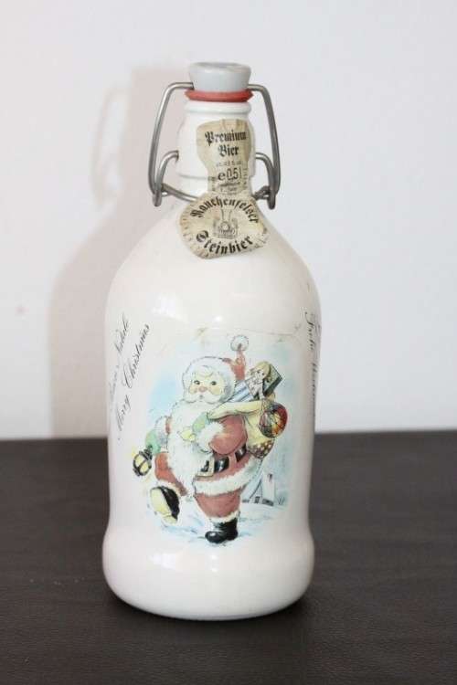 An awesome vintage German "Rauchenfelser Steinbier" porcelain Xmas commemorative flip-top decanter