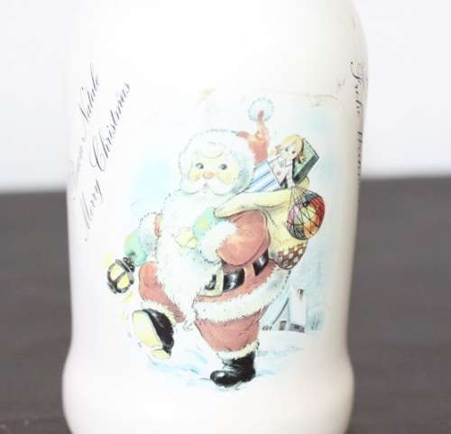 An awesome vintage German "Rauchenfelser Steinbier" porcelain Xmas commemorative flip-top decanter