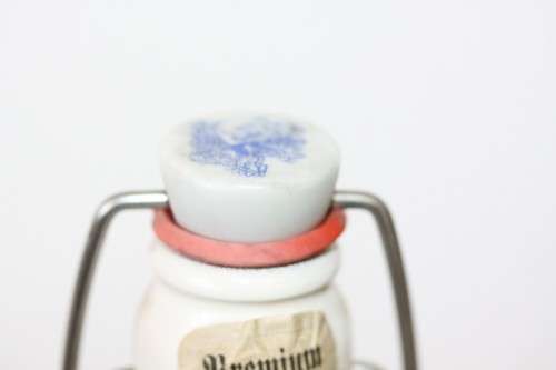 An awesome vintage German "Rauchenfelser Steinbier" porcelain Xmas commemorative flip-top decanter