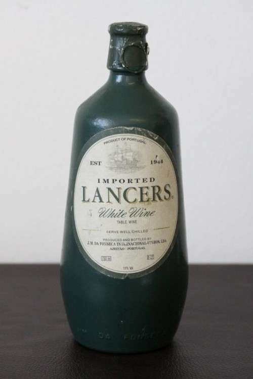 An awesome and very collectable vintage "Lancers" White wine in a stoneware decanter