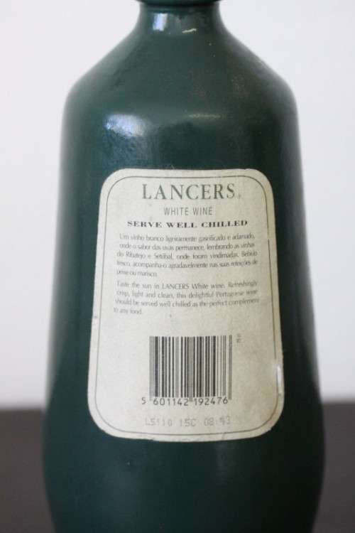 An awesome and very collectable vintage "Lancers" White wine in a stoneware decanter
