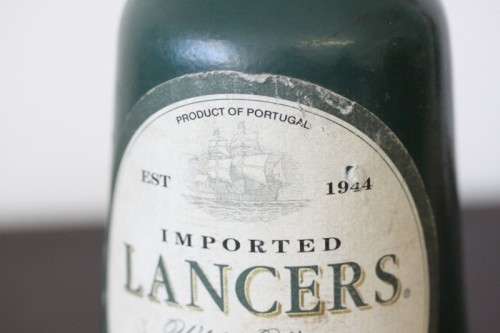 An awesome and very collectable vintage "Lancers" White wine in a stoneware decanter