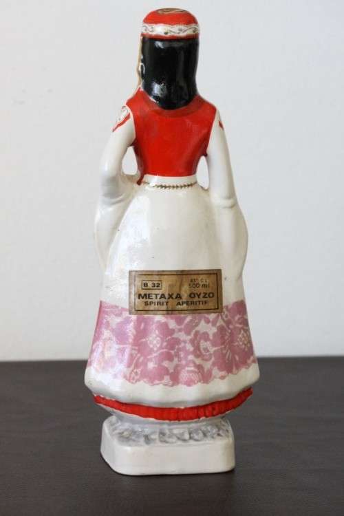 A beautiful vintage Greek "Metaxa Oyzo" hand-painted decanter of a traditional Greek Woman RS17Sale