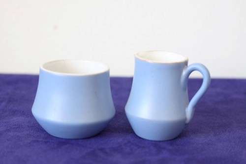 A gorgeous "Tea-For-Two" terracotta stoneware milk jug/ creamer and sugar bowl set in a soft blue