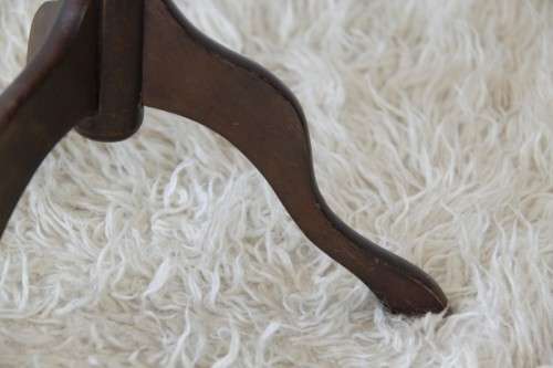 Two magnificent antique Victorian mahogany tri-leg occasional tables w/ leather clad tops- bid/table