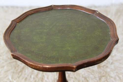 Two magnificent antique Victorian mahogany tri-leg occasional tables w/ leather clad tops- bid/table