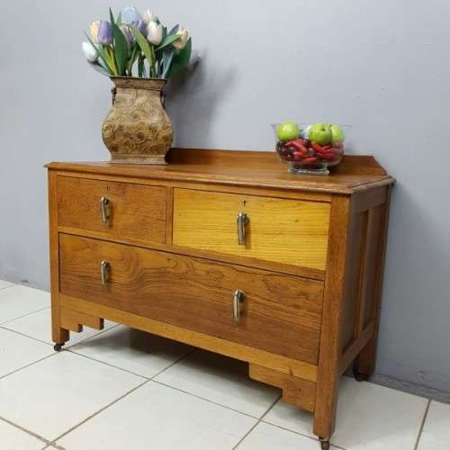 An incredible antique Art Deco "low-boy" chest of drawers with the original Art Deco handles