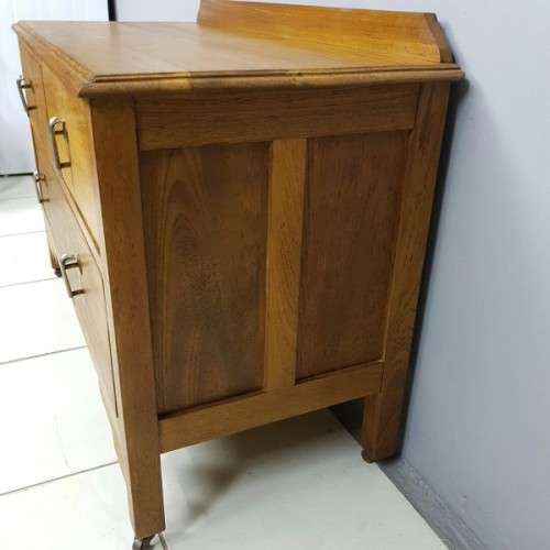 An incredible antique Art Deco "low-boy" chest of drawers with the original Art Deco handles
