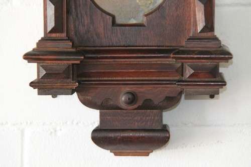 A spectacular antique (c.1890) German regulatory pendulum wall clock with a porcelain clock face