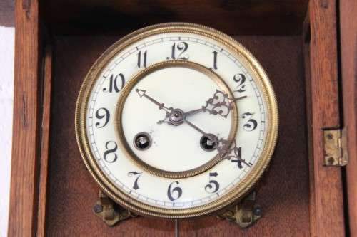 A spectacular antique (c.1890) German regulatory pendulum wall clock with a porcelain clock face