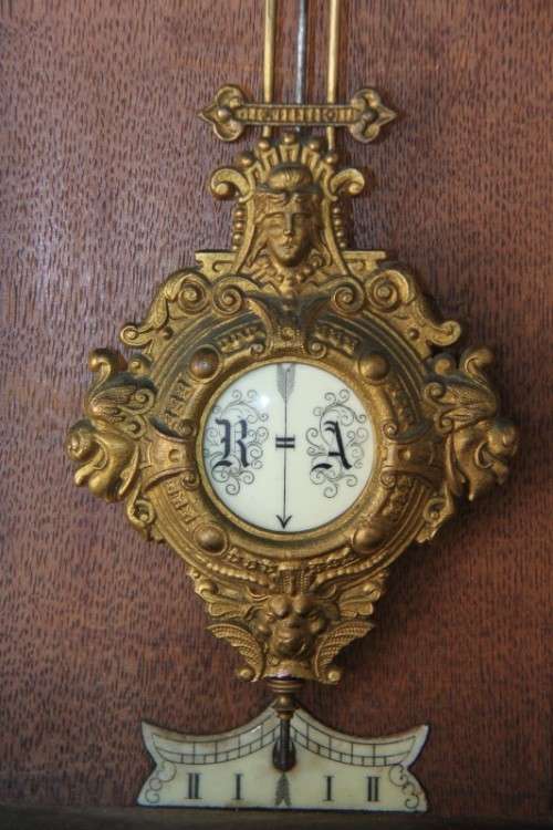 A spectacular antique (c.1890) German regulatory pendulum wall clock with a porcelain clock face