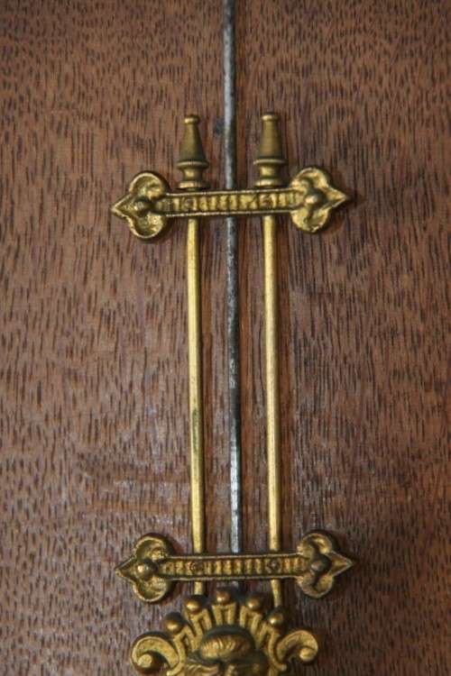 A spectacular antique (c.1890) German regulatory pendulum wall clock with a porcelain clock face