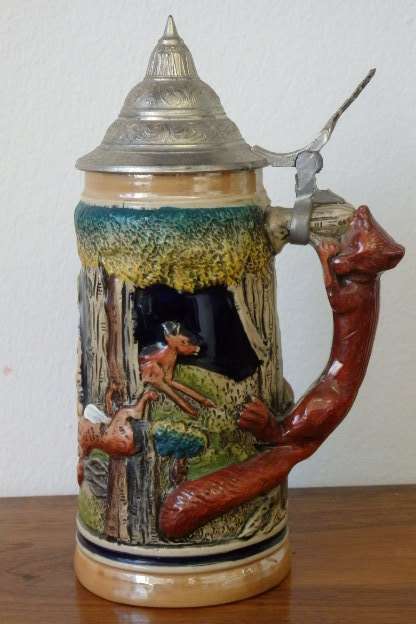 A fabulous vintage German made stoneware (lidded) Stein w/ traditional hand glazed detailing