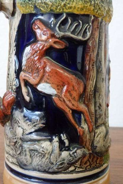 A fabulous vintage German made stoneware (lidded) Stein w/ traditional hand glazed detailing