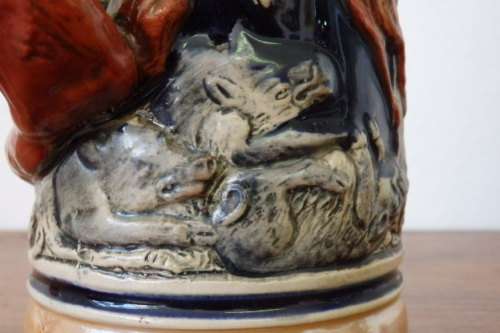 A fabulous vintage German made stoneware (lidded) Stein w/ traditional hand glazed detailing