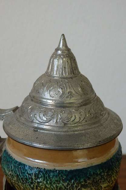 A fabulous vintage German made stoneware (lidded) Stein w/ traditional hand glazed detailing