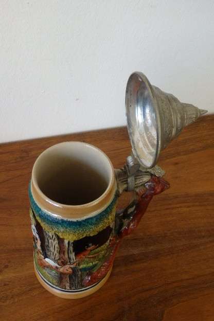 A fabulous vintage German made stoneware (lidded) Stein w/ traditional hand glazed detailing