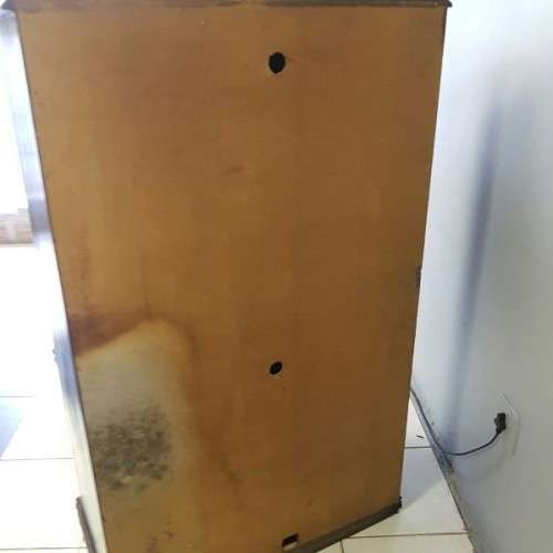 A wonderful dark stained four-door TV entertainment unit with ample space for components