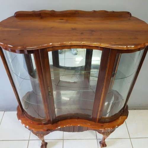 A beautiful antique curved glass ball & claw showcase w/ shelves, all glass intact!!! Exquisite!!!