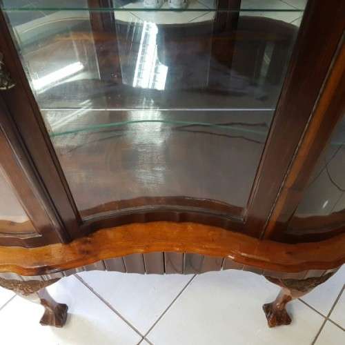 A beautiful antique curved glass ball & claw showcase w/ shelves, all glass intact!!! Exquisite!!!