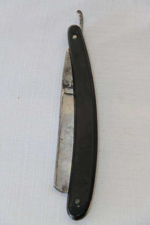 A superb set of antique "The Alexander Clark Co Ltd" cut throat razors in their original box