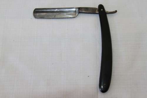 A superb set of antique "The Alexander Clark Co Ltd" cut throat razors in their original box