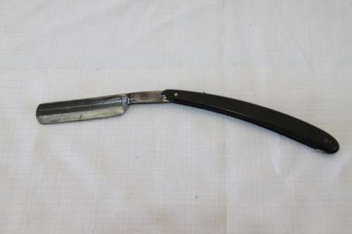 A superb set of antique "The Alexander Clark Co Ltd" cut throat razors in their original box