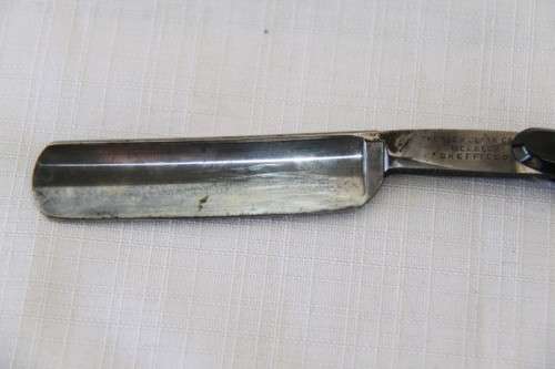 A superb set of antique "The Alexander Clark Co Ltd" cut throat razors in their original box