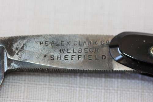 A superb set of antique "The Alexander Clark Co Ltd" cut throat razors in their original box