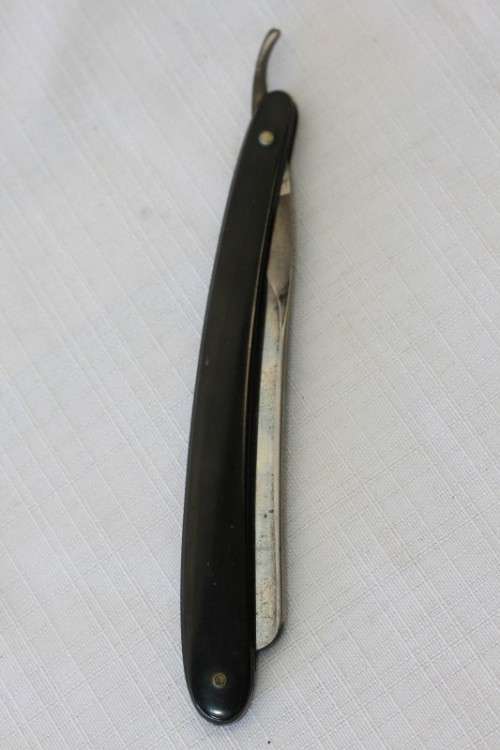 An amazing rare antique "J.A Kenckels Solingen" German cut throat razor in its original box