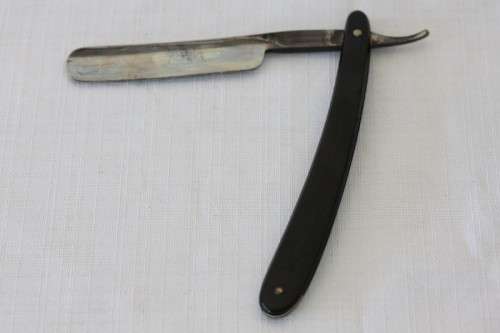 An amazing rare antique "J.A Kenckels Solingen" German cut throat razor in its original box
