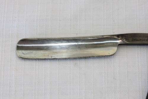 An amazing rare antique "J.A Kenckels Solingen" German cut throat razor in its original box