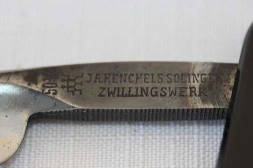 An amazing rare antique "J.A Kenckels Solingen" German cut throat razor in its original box