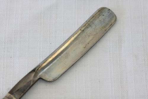 An amazing rare antique "J.A Kenckels Solingen" German cut throat razor in its original box