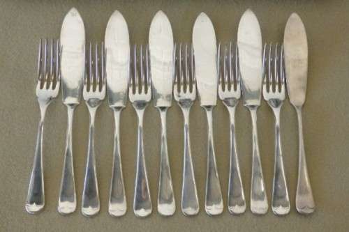 An amazing vintage Yeoman Art Deco fish knife and fork set w/ matching knife and fork serving set