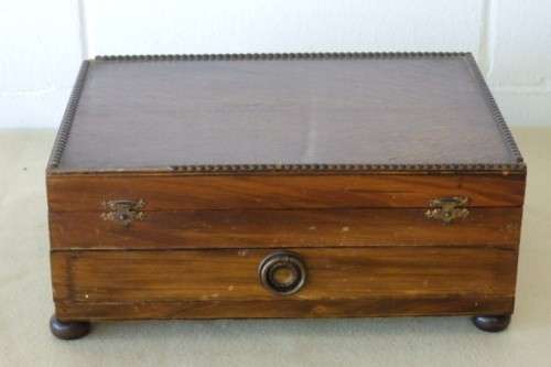 A wonderful vintage 52 piece cutlery set in a stunning vintage 3-division wooden canteen