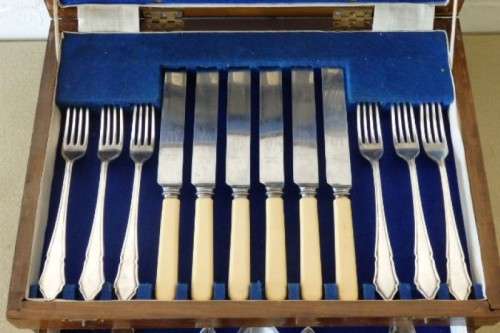 A wonderful vintage 52 piece cutlery set in a stunning vintage 3-division wooden canteen