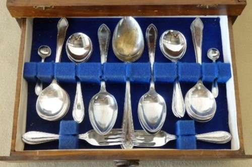 A wonderful vintage 52 piece cutlery set in a stunning vintage 3-division wooden canteen