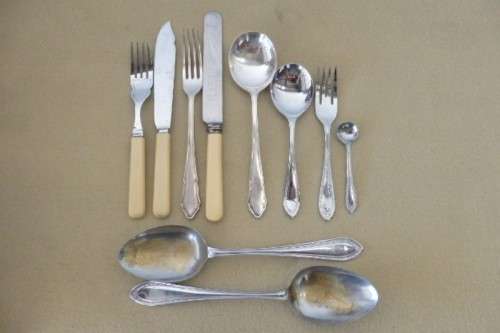 A wonderful vintage 52 piece cutlery set in a stunning vintage 3-division wooden canteen