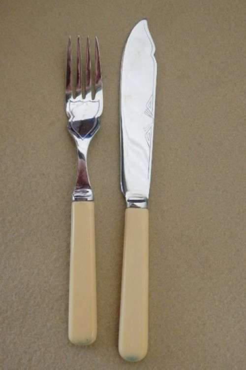 A wonderful vintage 52 piece cutlery set in a stunning vintage 3-division wooden canteen