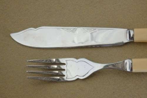 A wonderful vintage 52 piece cutlery set in a stunning vintage 3-division wooden canteen