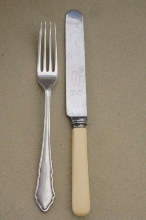 A wonderful vintage 52 piece cutlery set in a stunning vintage 3-division wooden canteen