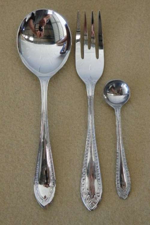 A wonderful vintage 52 piece cutlery set in a stunning vintage 3-division wooden canteen