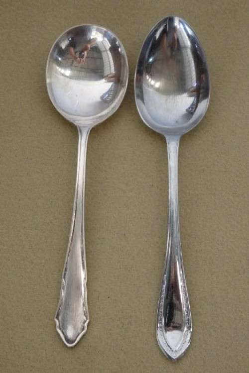 A wonderful vintage 52 piece cutlery set in a stunning vintage 3-division wooden canteen