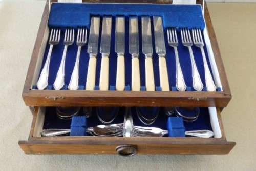 A wonderful vintage 52 piece cutlery set in a stunning vintage 3-division wooden canteen