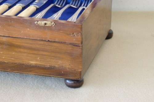 A wonderful vintage 52 piece cutlery set in a stunning vintage 3-division wooden canteen