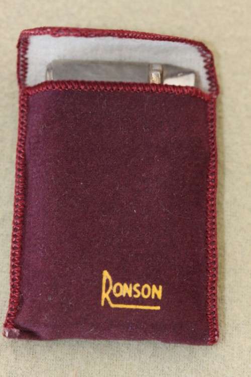 A spectacular vintage original "Ronson Varaflame" cigarette butane lighter made in England